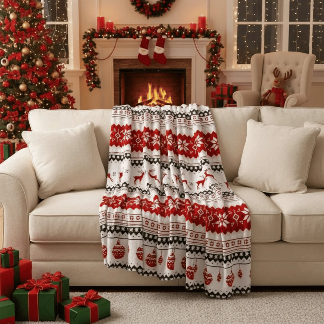 Couverture de Noël en situation sur un canapé ou un lit
