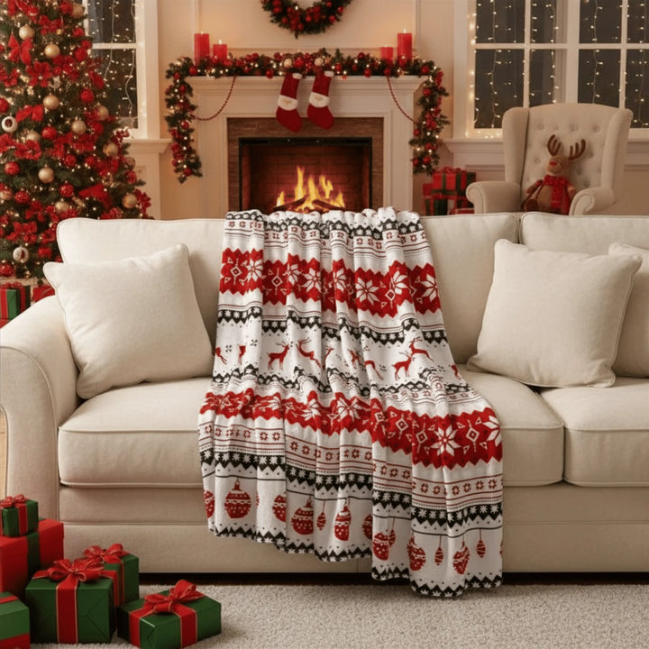 Couverture de Noël en situation sur un canapé ou un lit